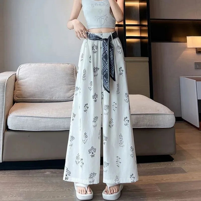 Meadow | Pantalón palazzo fluido con estampado botánico