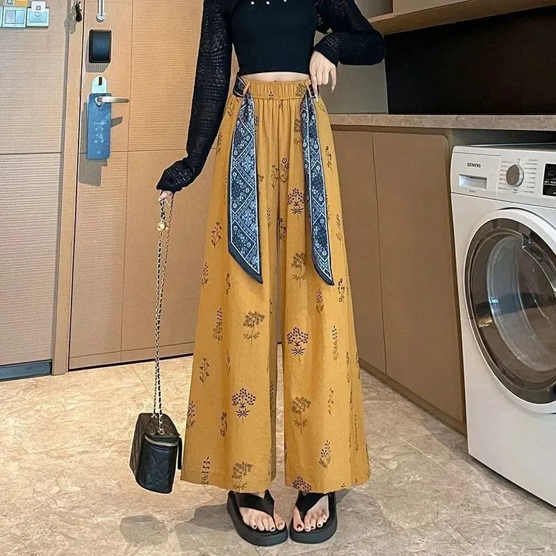 Meadow | Pantalón palazzo fluido con estampado botánico